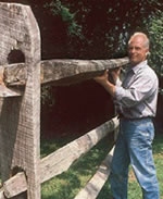 Man with Arthritis Building Fence